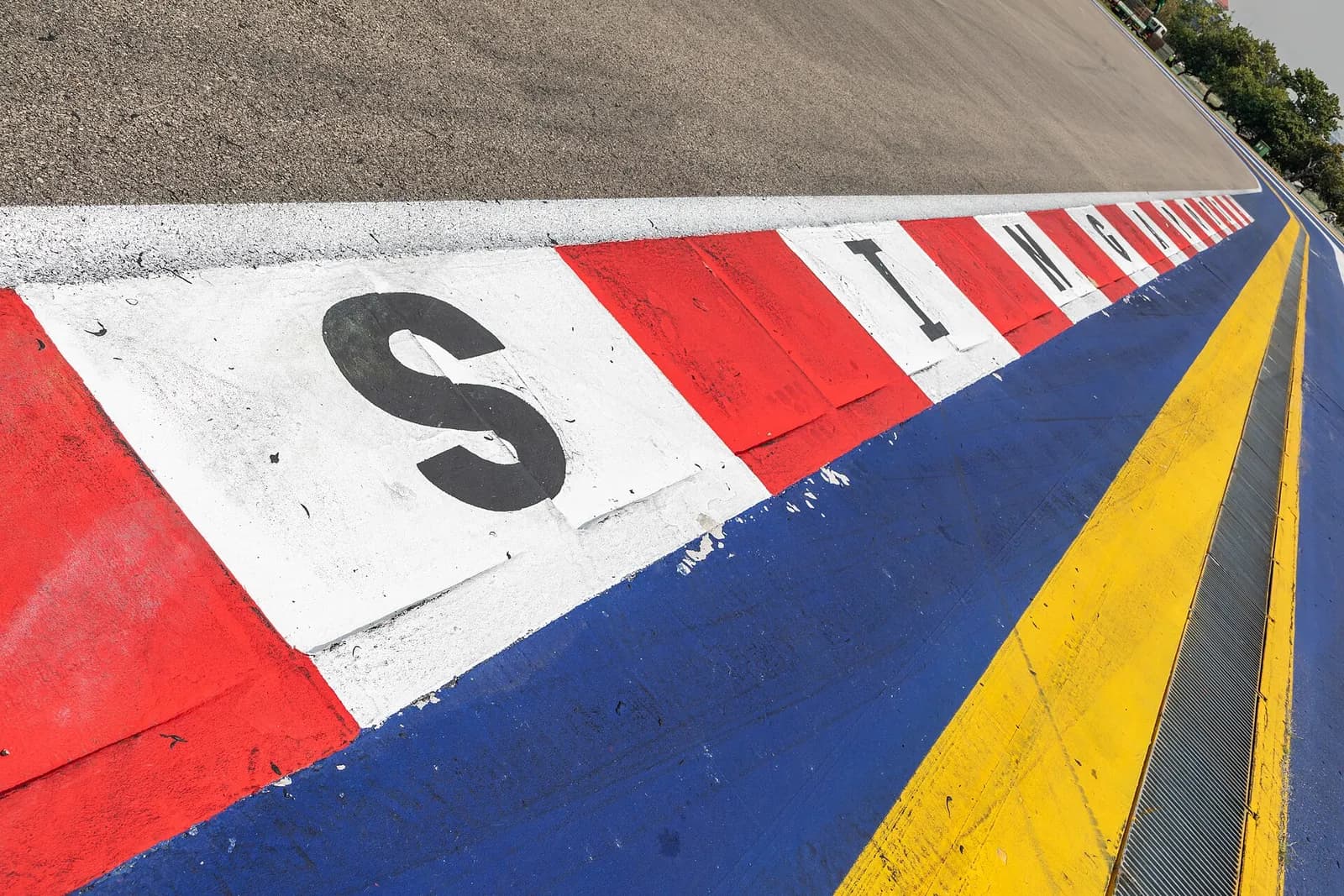 The Marina Bay Street Circuit in Singapore, with the word Singapore marked on the road.