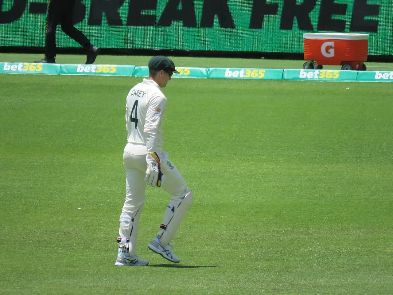 Alex Carey wicketkeeping during an Australia versus West Indies Test at Perth Stadium in 2022