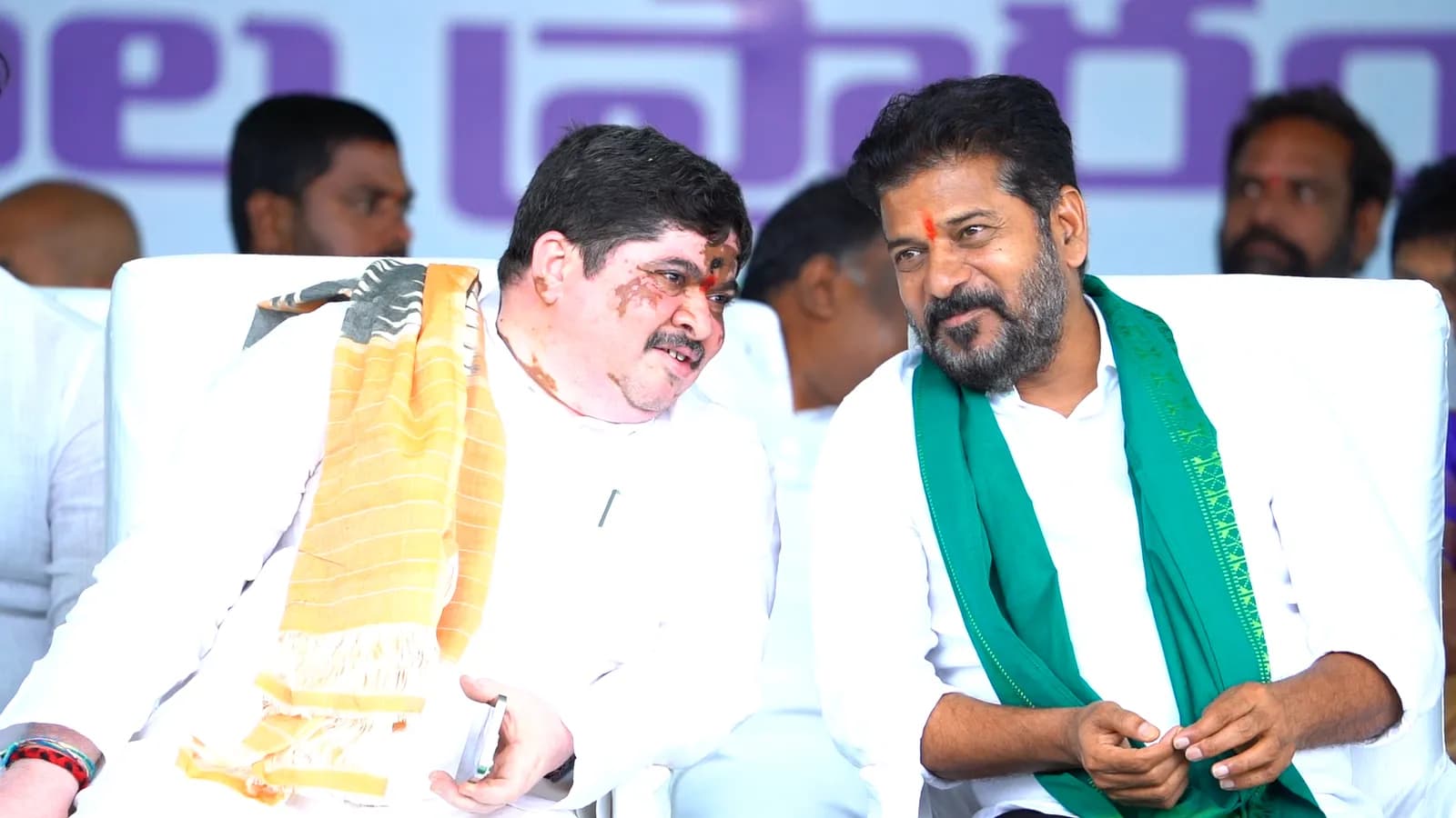 A. Revanth Reddy with Ponnam Prabhakar at a public meeting in 2025.