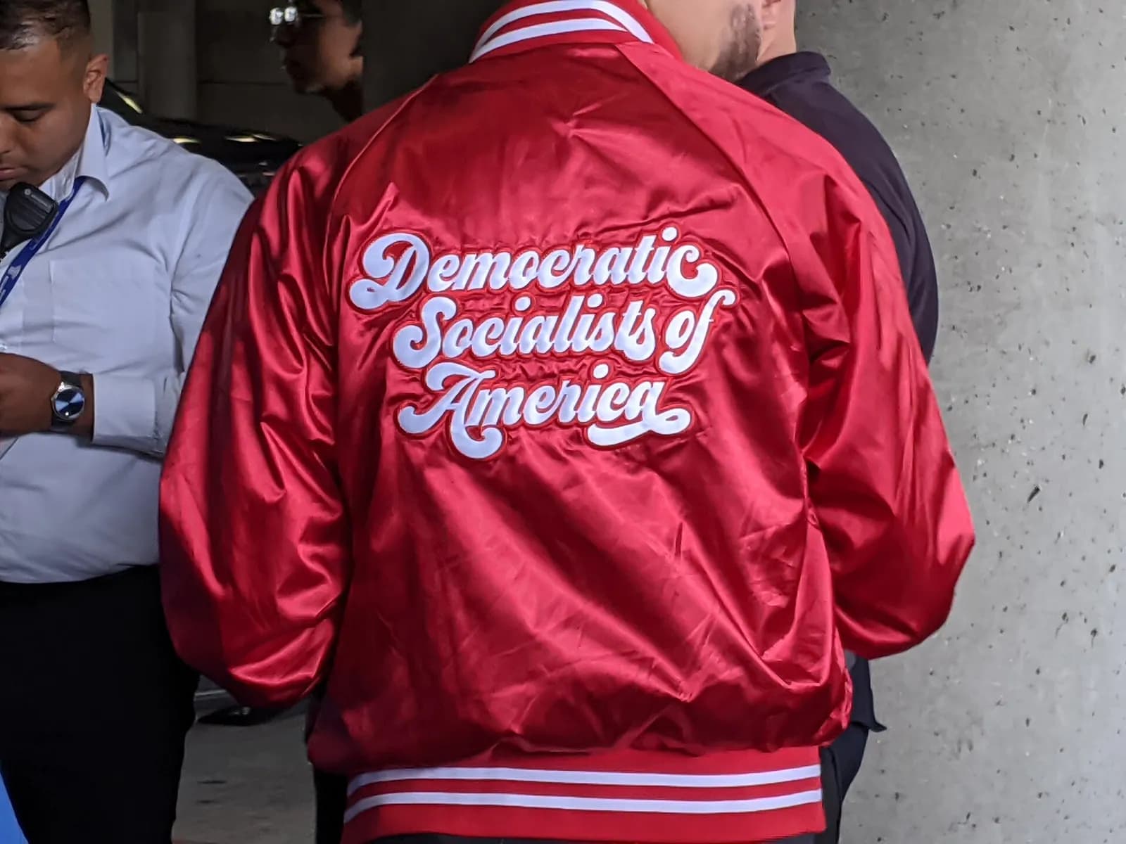 A jacket bearing the Democratic Socialists of America name at a Bernie Sanders rally.