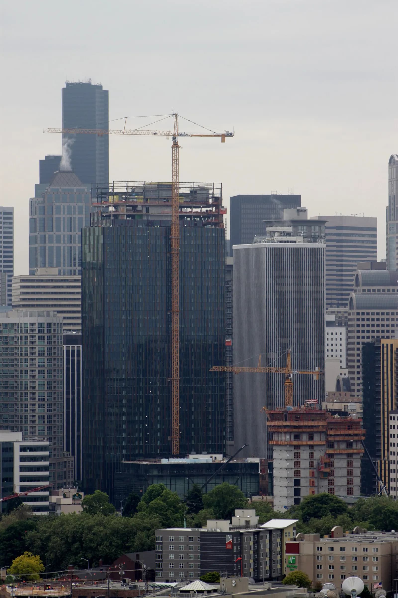 Amazon headquarters complex under construction, viewed from Bhy Kracke Park in Seattle.