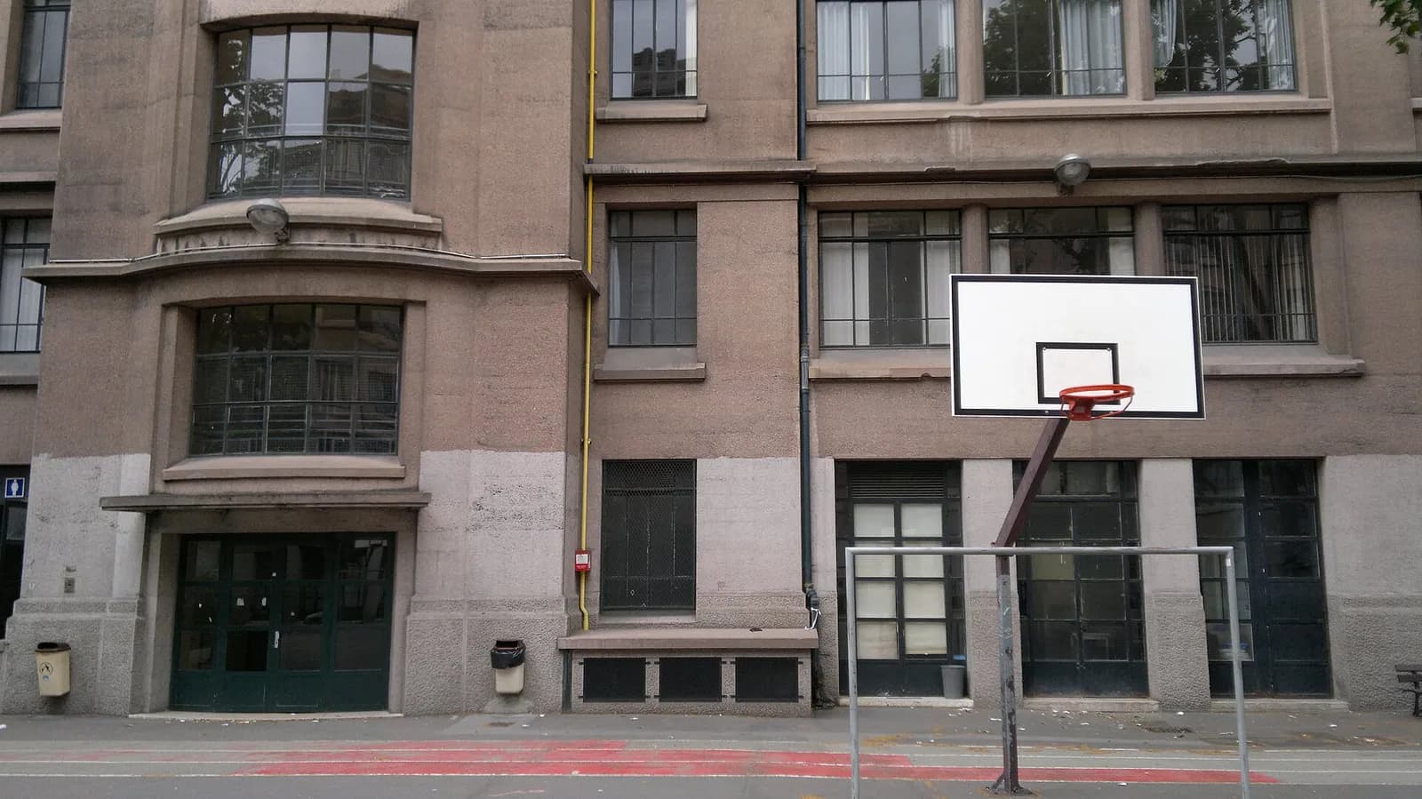 Exterior view of Lycée Hélène-Boucher on Cours de Vincennes in Paris.
