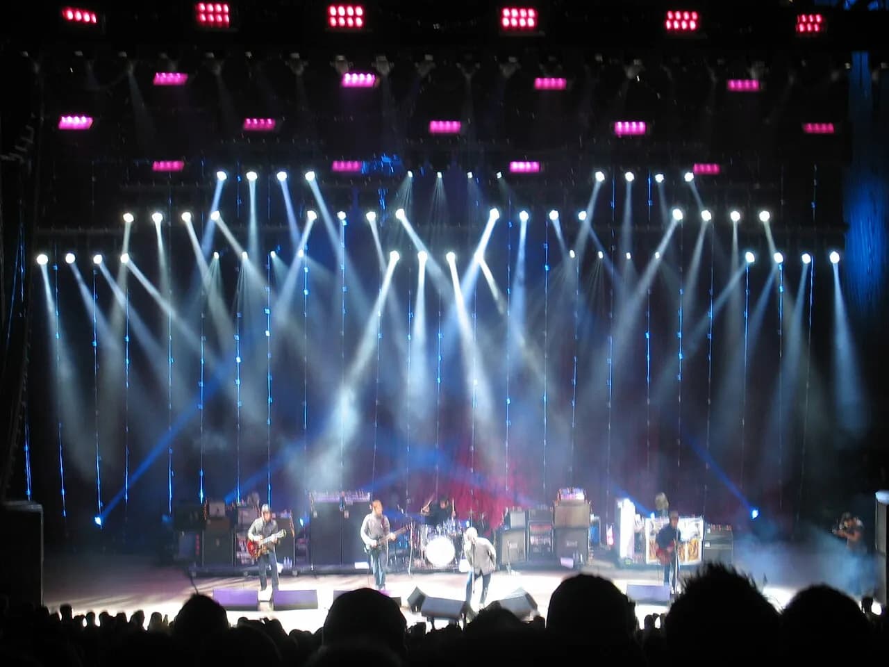 Oasis performing onstage at Shoreline Amphitheatre in 2005