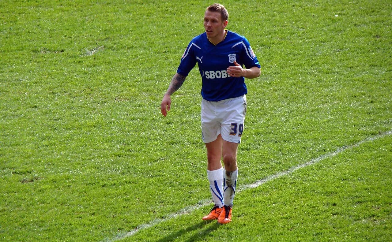Craig Bellamy playing for Cardiff City against Derby County in 2011