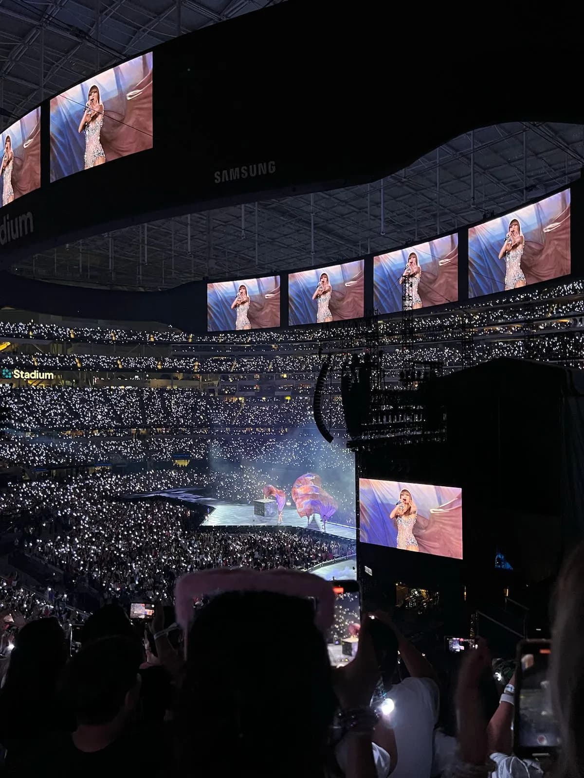 Taylor Swift performing onstage during the Eras Tour in Inglewood, California, in August 2023