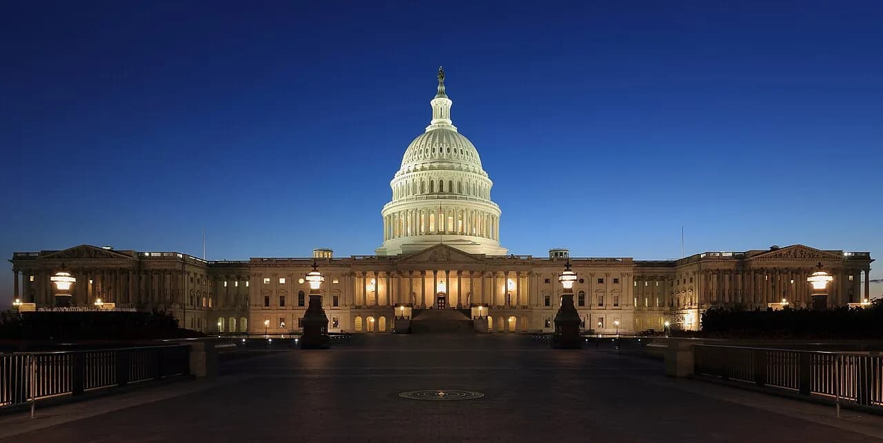 East side of the US Capitol illuminated at dusk in Washington, DC