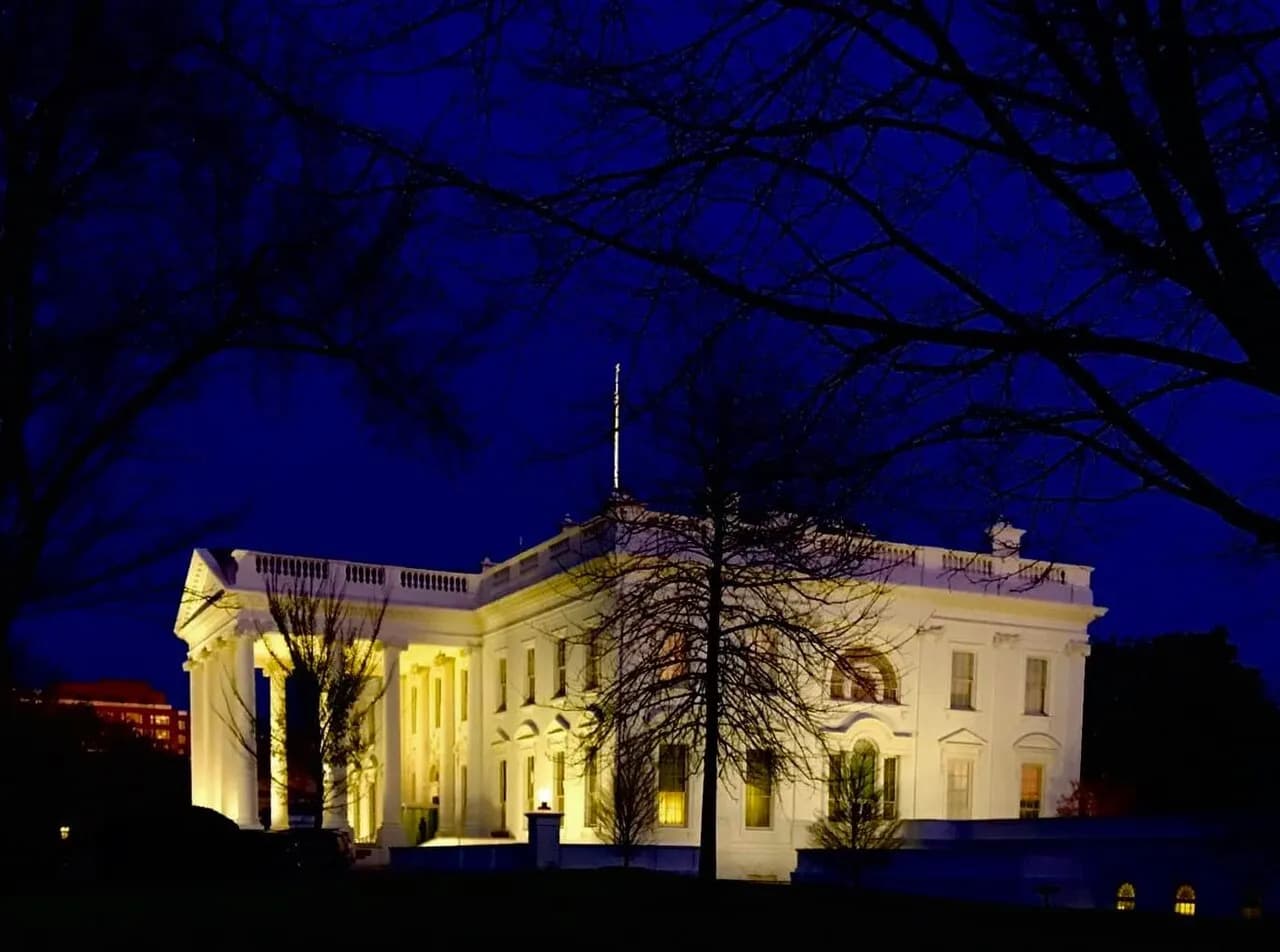 The north side of the White House illuminated at night