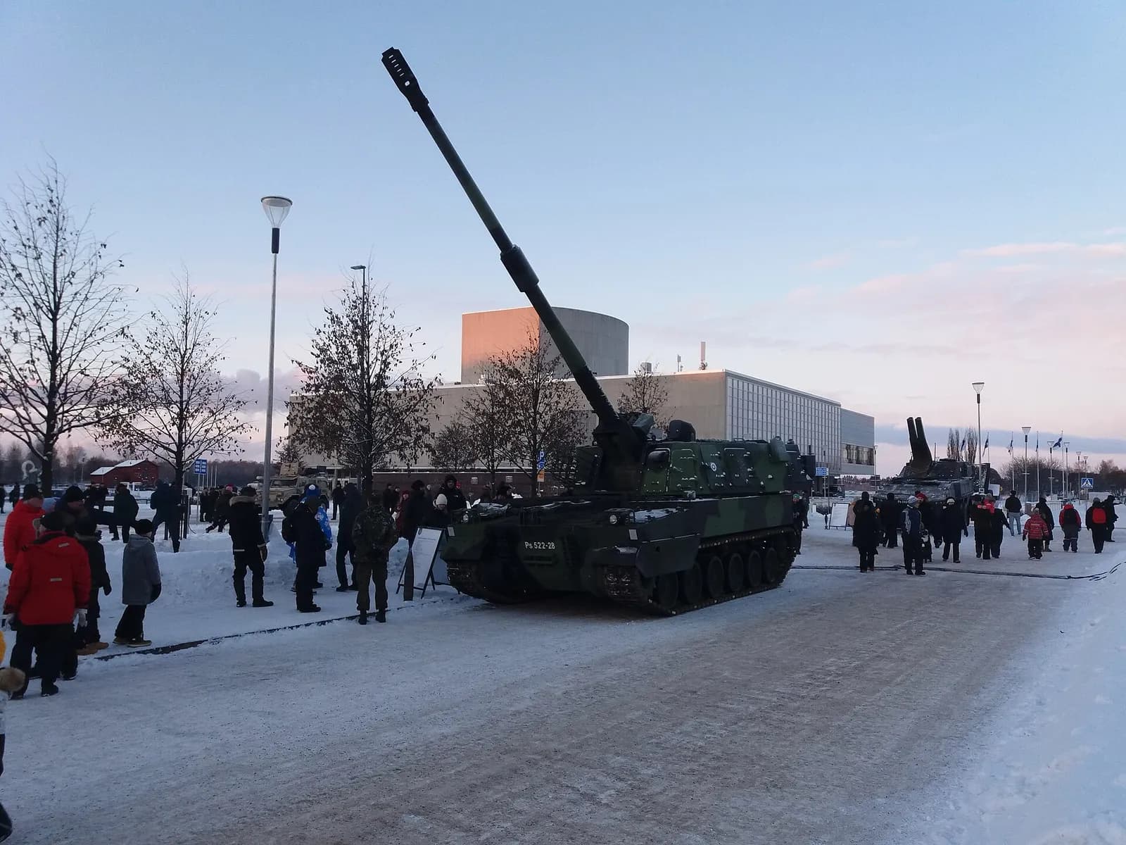 A Finnish Defence Forces K9 Thunder self-propelled howitzer displayed in a snowy square in Oulu, Finland.