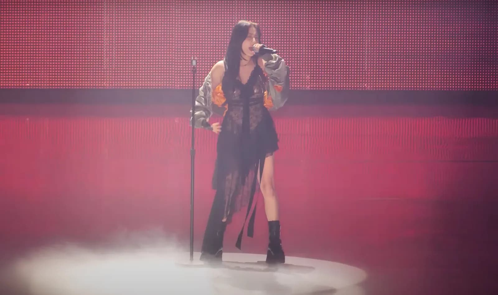 TWICE member Jihyo performing onstage during the group’s Ready to Be tour.
