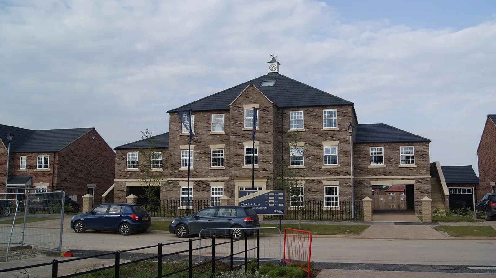 Apartment building at a Bellway development in Wetherby, with roadworks in the foreground.