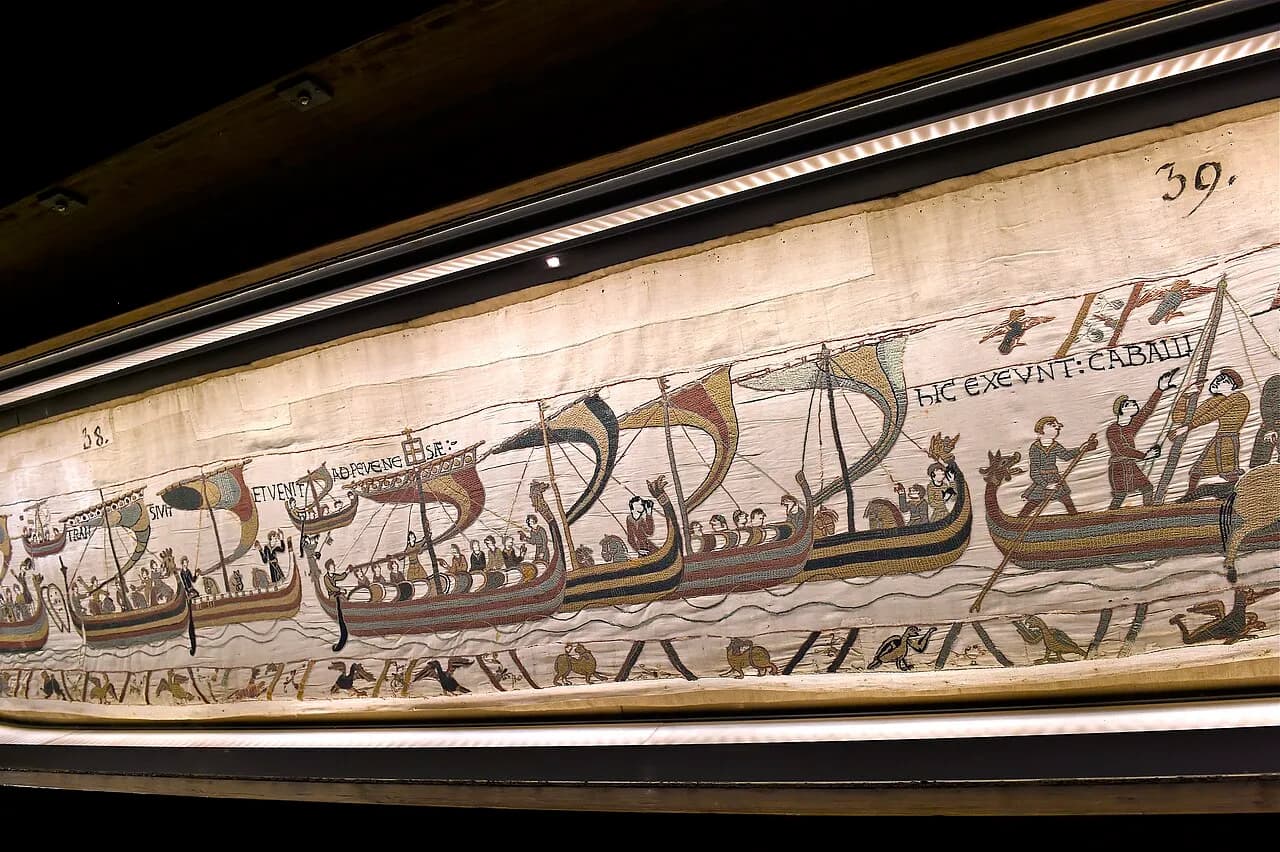 The Bayeux Tapestry displayed in a museum gallery in Bayeux, France.