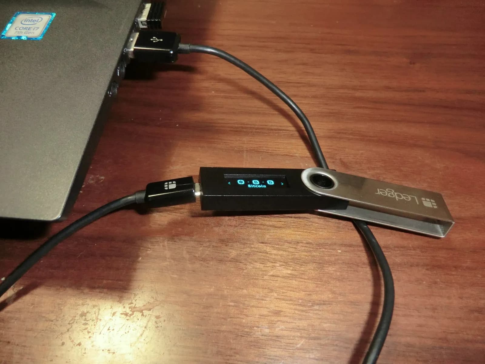 Ledger Nano S hardware wallet photographed on a surface.