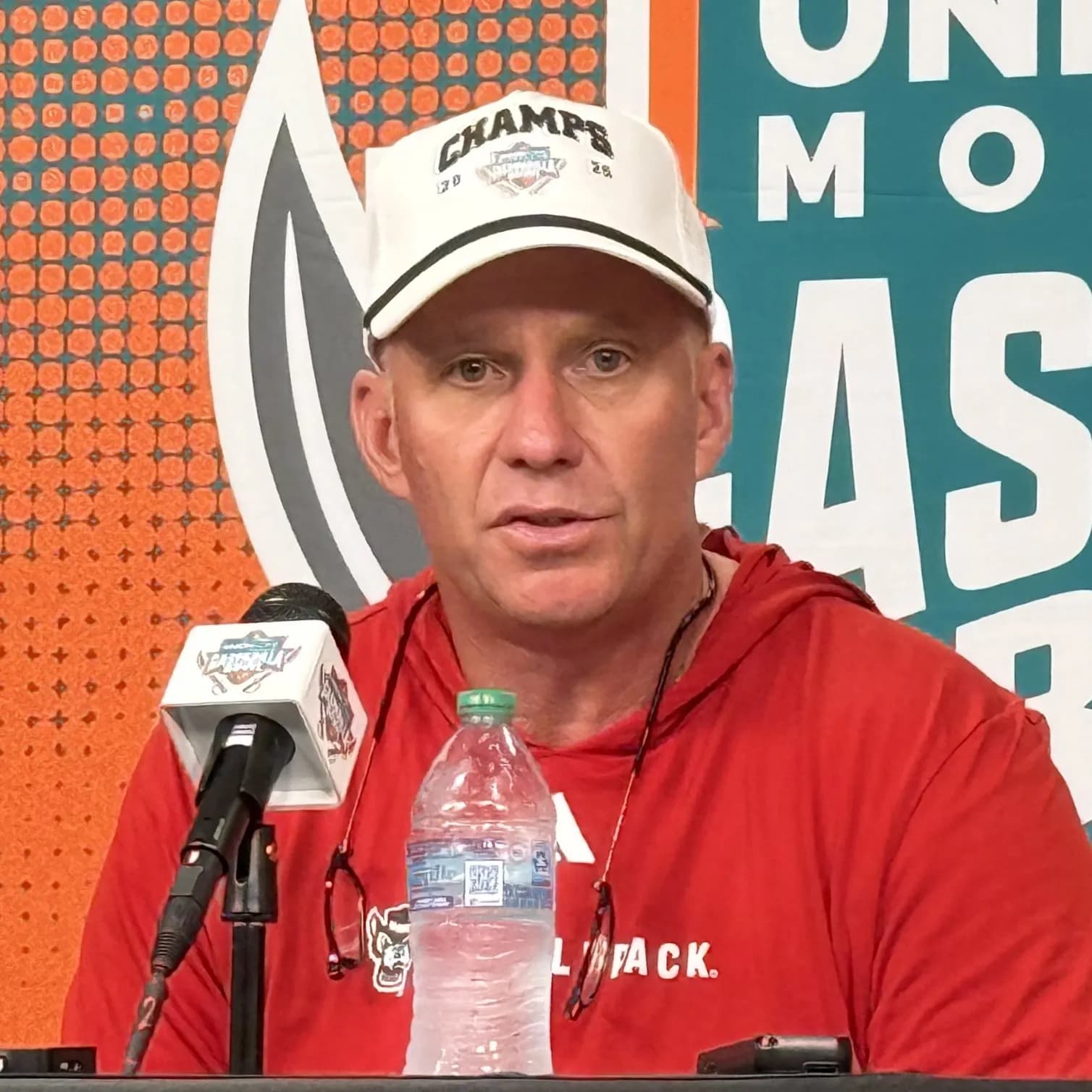Dave Doeren speaks at a press conference after NC State’s 2025 Gasparilla Bowl victory.