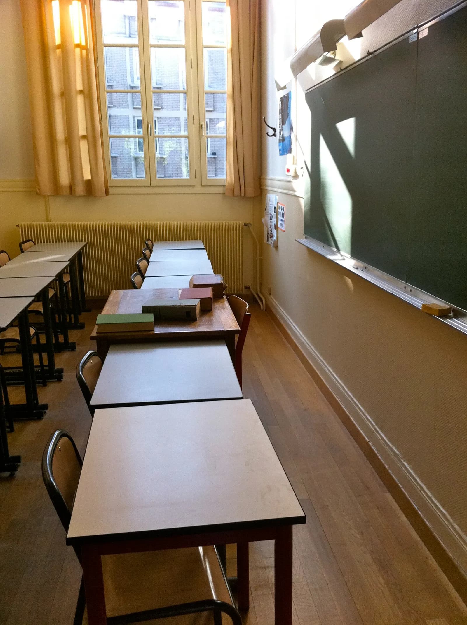Rows of desks in a classroom at Lycée Molière in Paris.