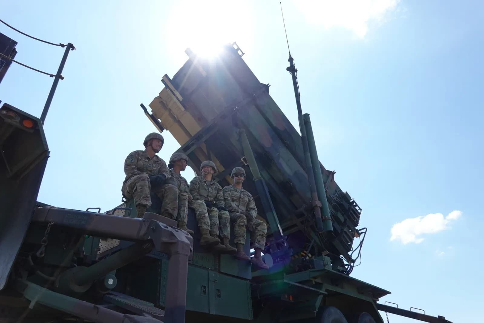 Soldiers rest on a Patriot missile launcher in Slovakia.