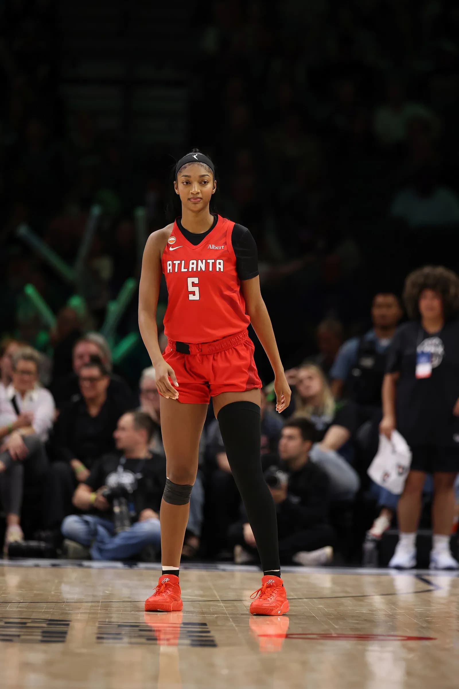 Angel Reese in Atlanta Dream uniform during a game against the Minnesota Lynx.