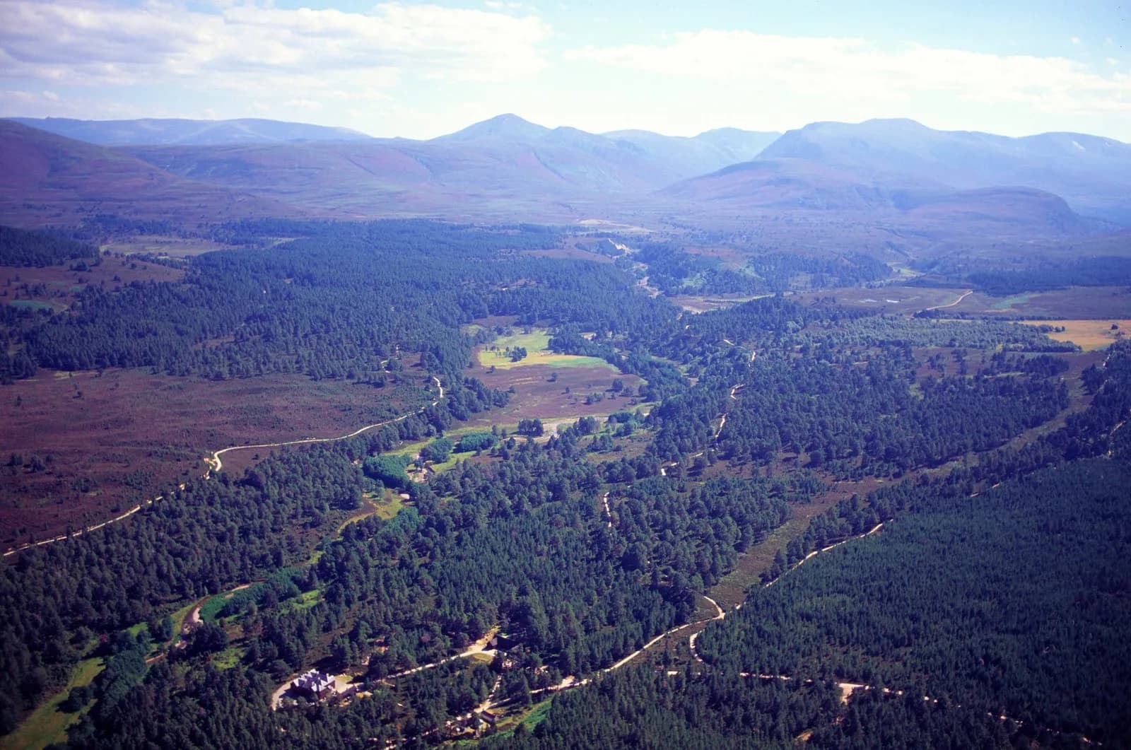 Aerial view south over the Cairngorms above the RSPB Abernethy Forest reserve, with Glenmore in view.