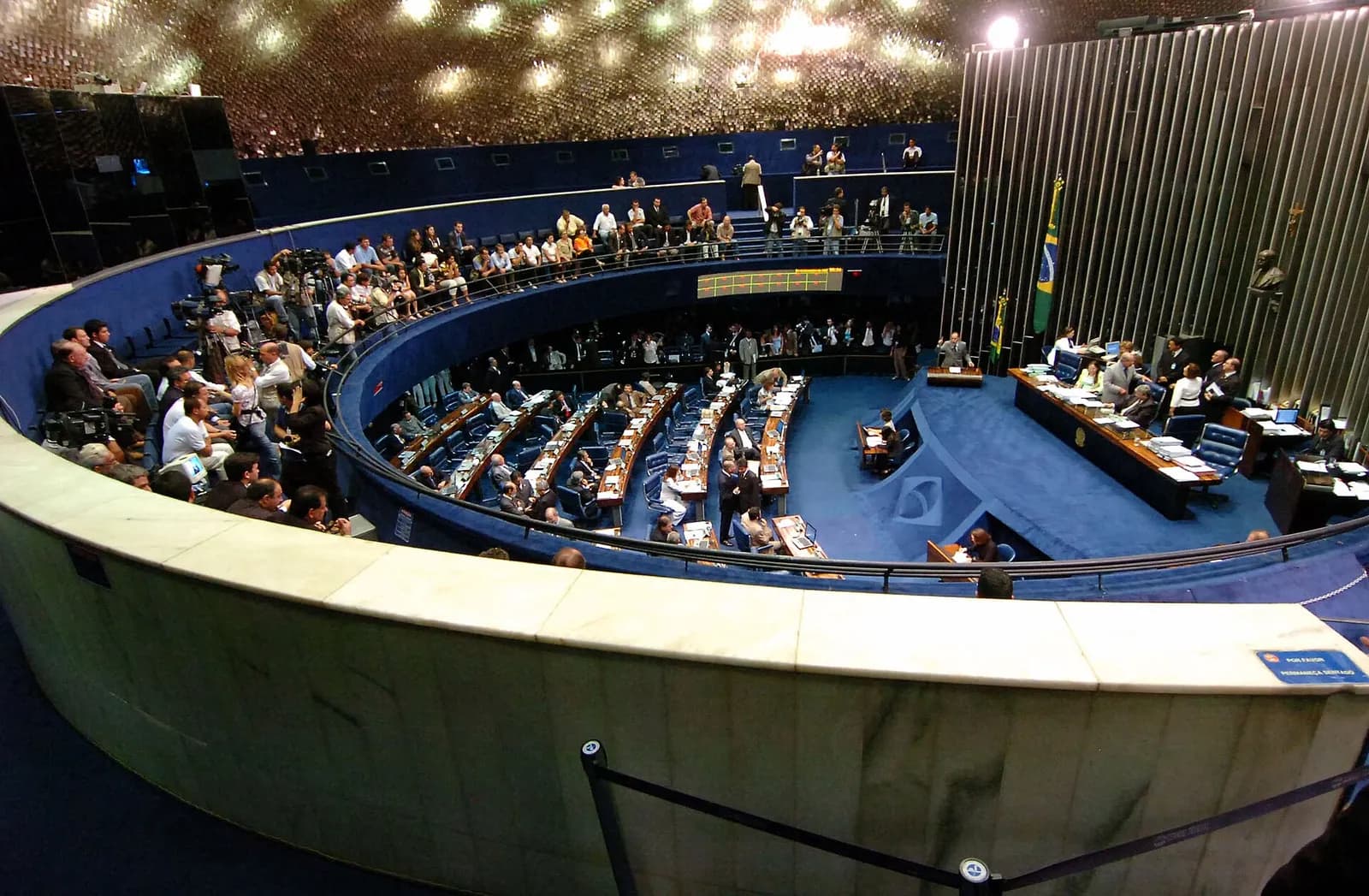 Rows of seats and desks in the plenary chamber of Brazil’s Federal Senate.