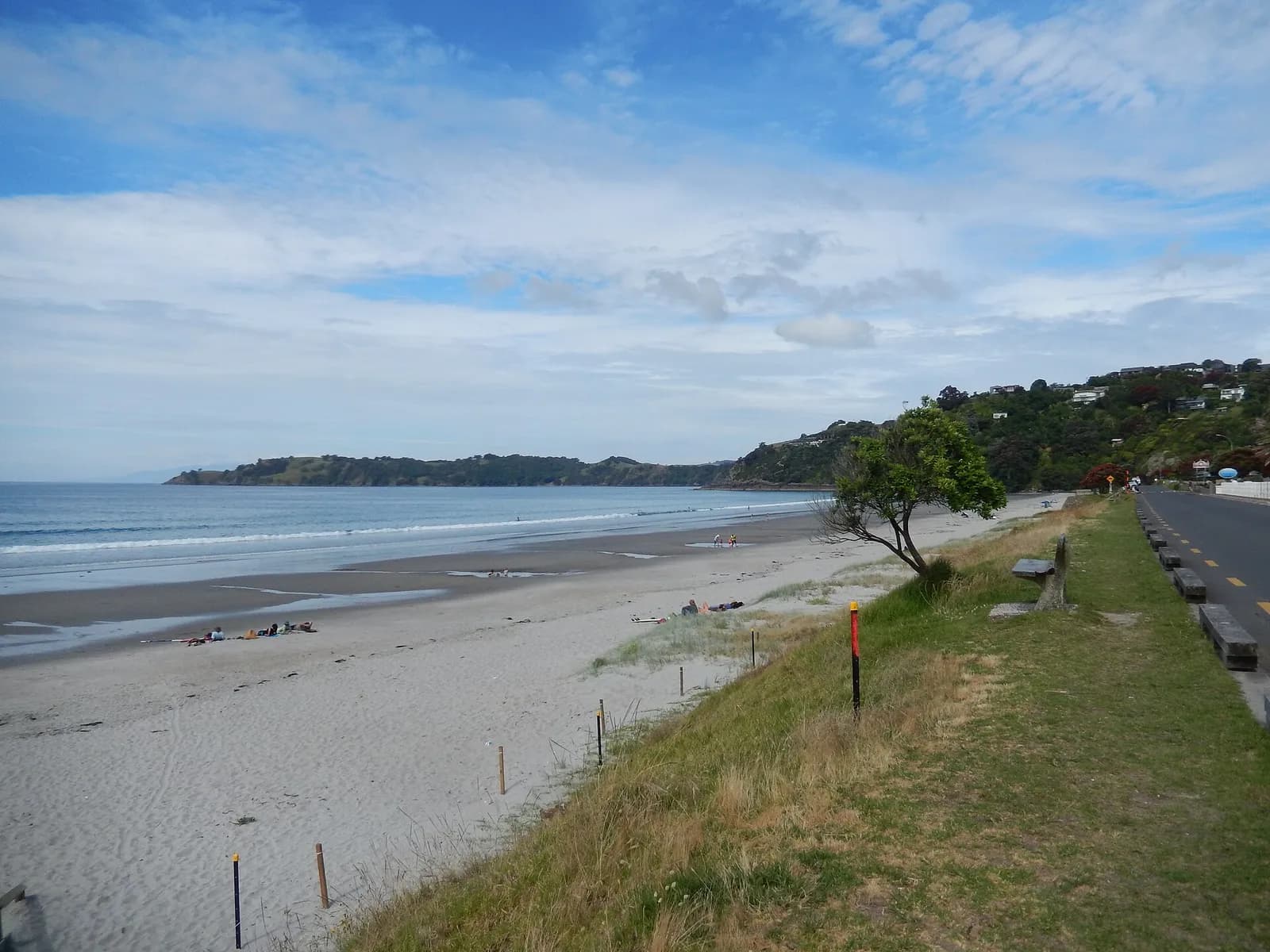 Onetangi Beach on Waiheke Island, Auckland, New Zealand, with The Strand at the right.