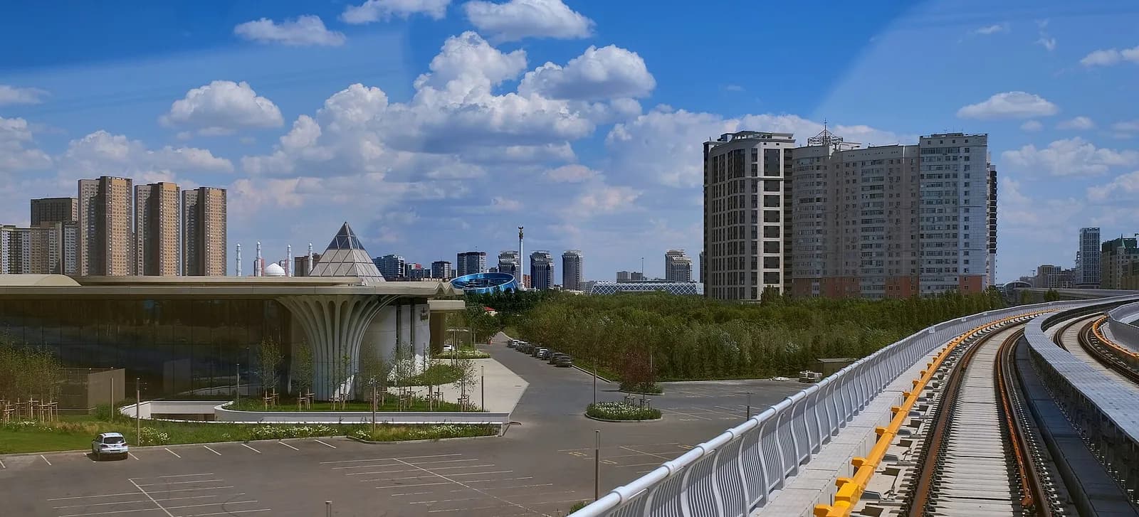 View east from an Astana light metro train between the National Museum and House of Ministries stations.