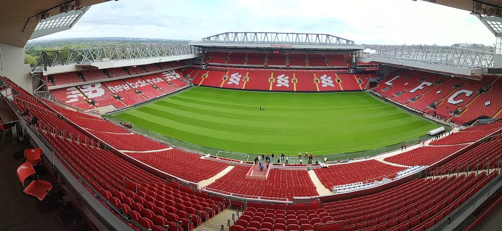 Panoramic view across the interior of Anfield stadium from the main stand.