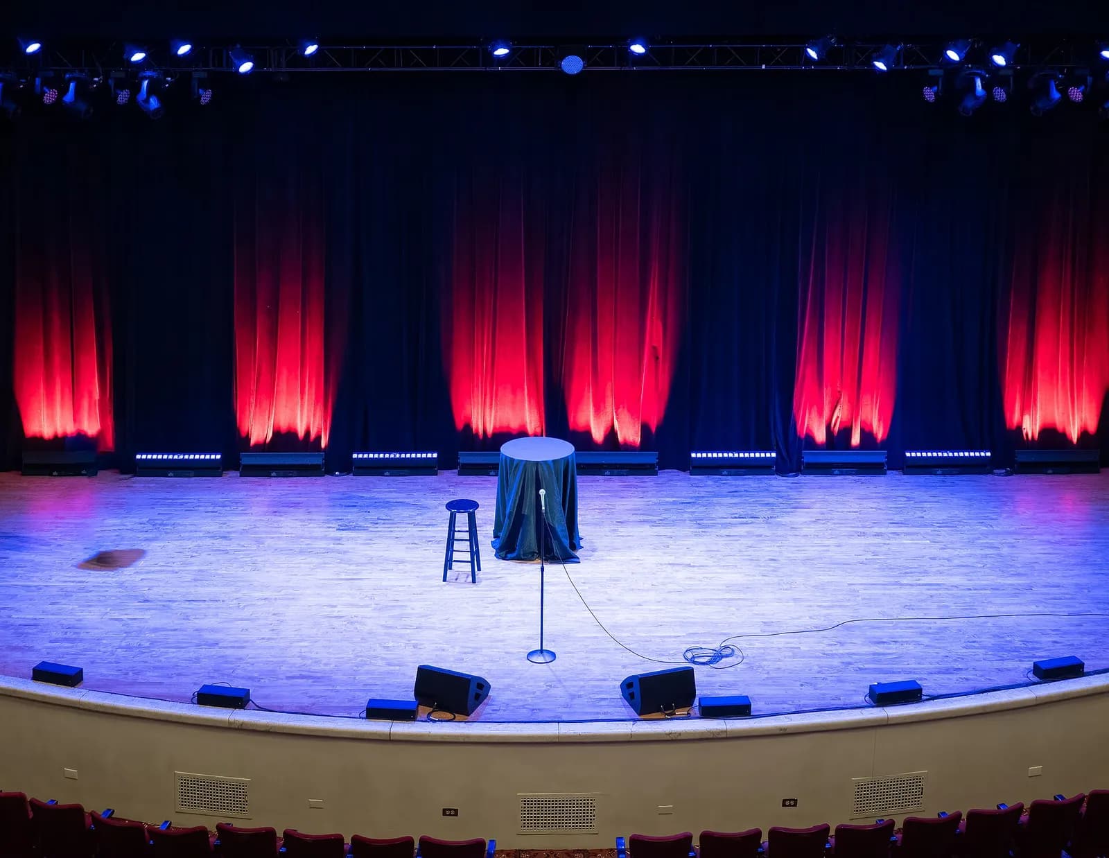 The stage at The Town Hall in New York, with rows of seats in the foreground.