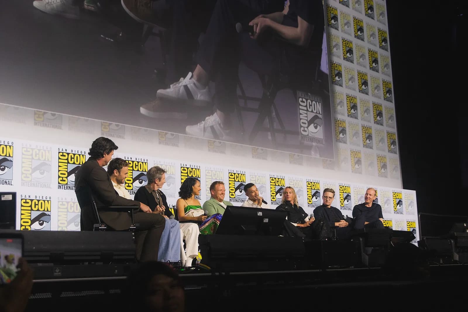 The Rings of Power cast and showrunners on a panel at San Diego Comic-Con.