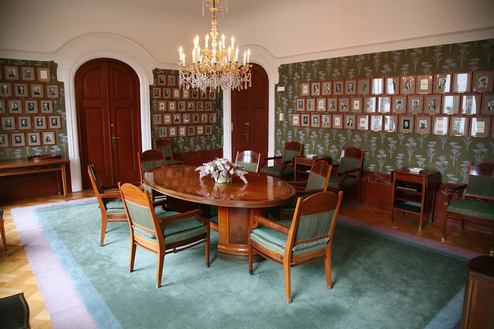 The meeting room of the Norwegian Nobel Committee, with portraits of Nobel Peace Prize laureates on the walls.