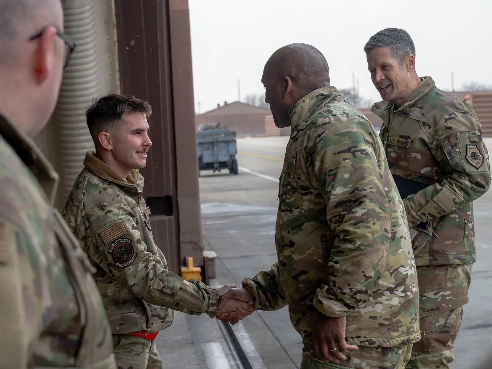 U.S. Army Gen. Xavier T. Brunson meets an airman during a visit to Osan Air Base, South Korea.