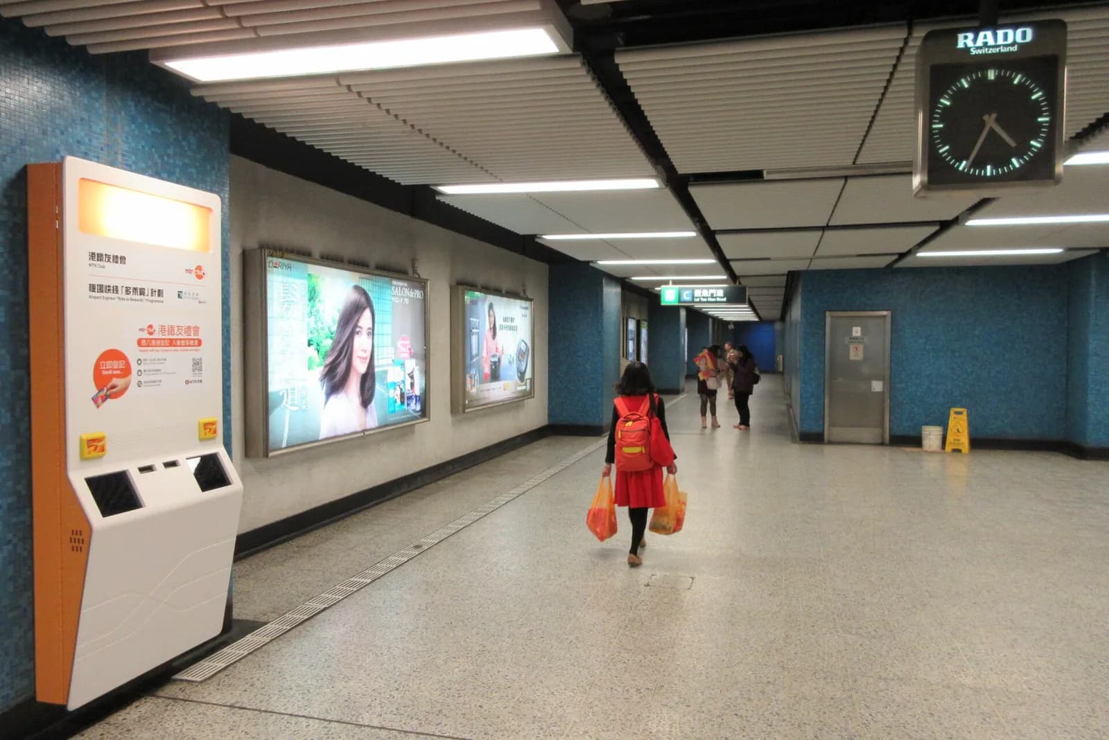 Interior of Lam Tin MTR station with a Rado clock, photographed in January 2017.