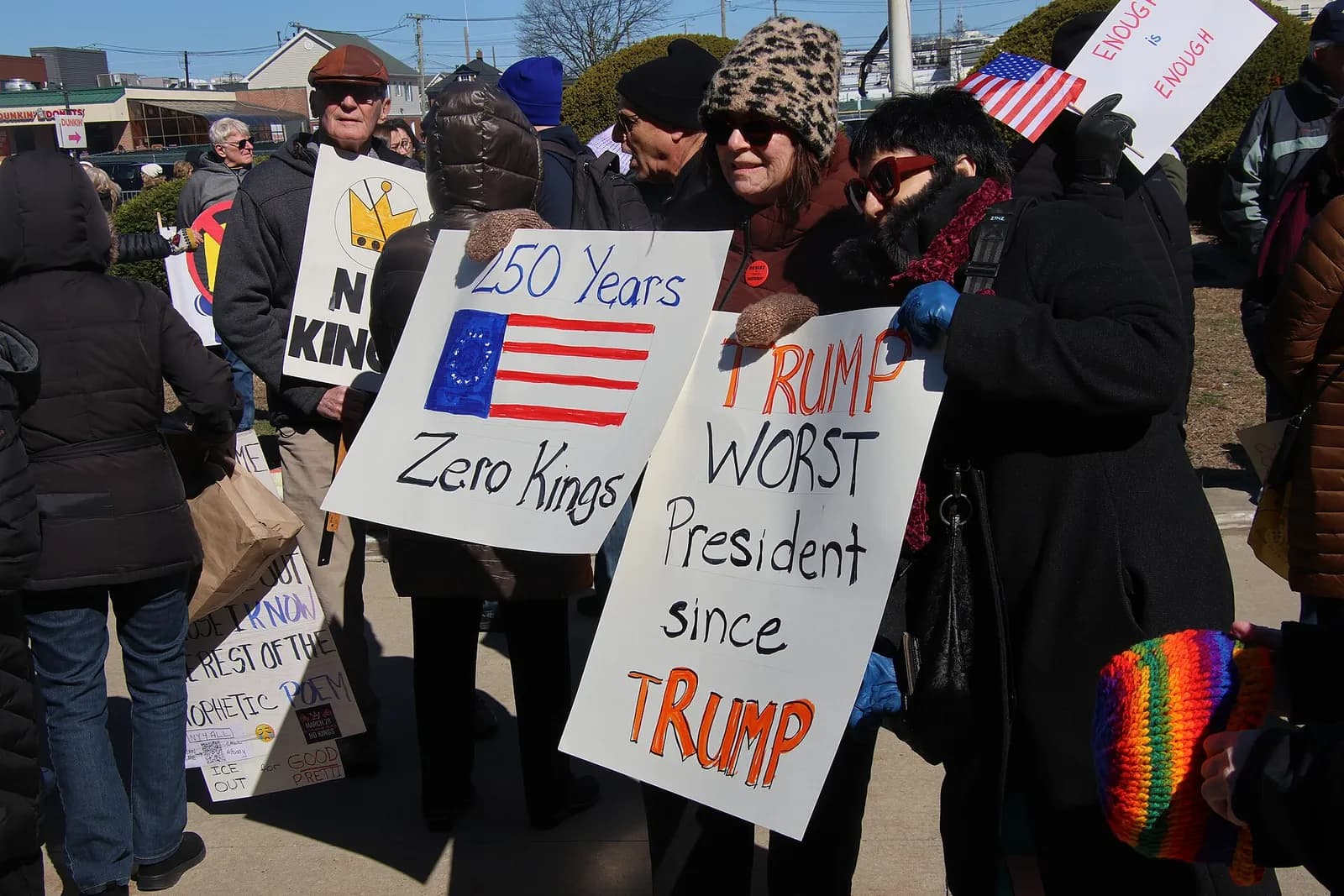 People gather at a No Kings rally in Mineola, New York.