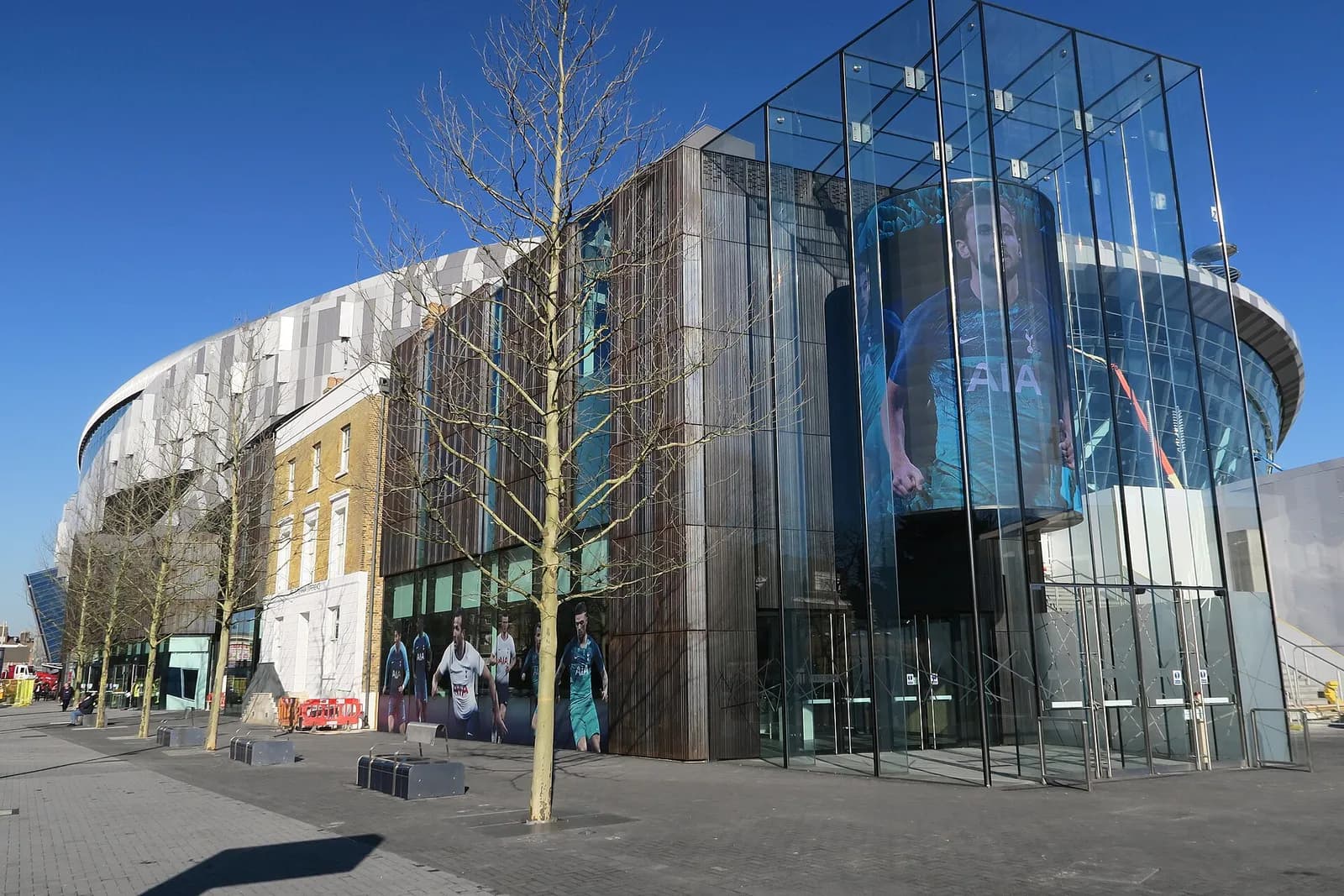 Exterior of Tottenham Hotspur Stadium and The Tottenham Experience along Tottenham High Road.