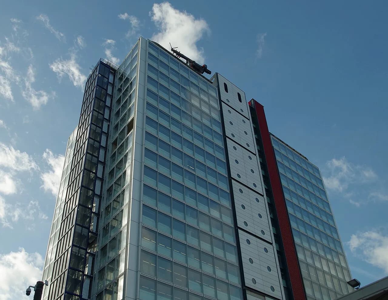 Upward view of the exterior of 5 Endeavour Square in Stratford, London