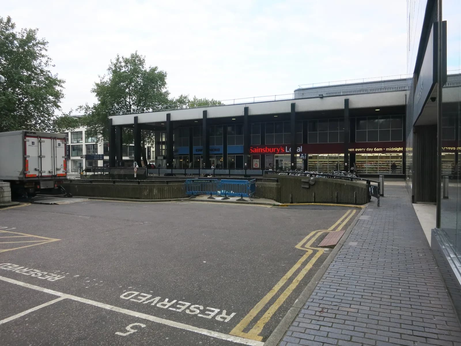Exterior of a Sainsbury's Local at Euston Station in London.