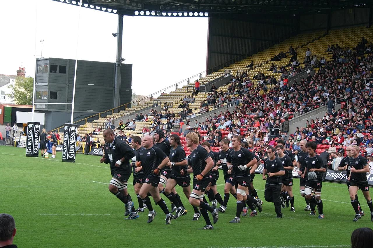Saracens rugby players on the field at Vicarage Road in 2005