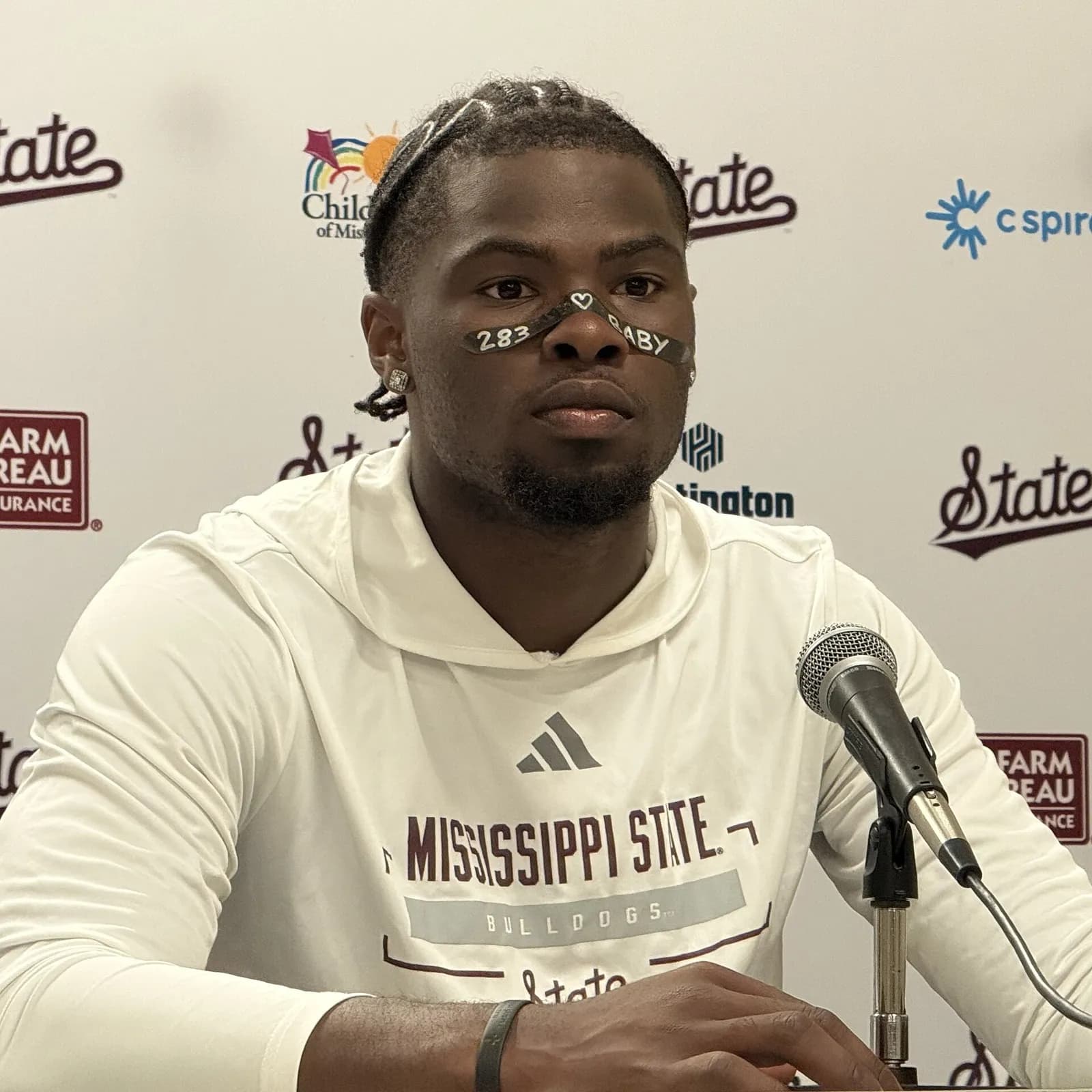 Mississippi State quarterback Kamario Taylor speaks at a post-game press conference.