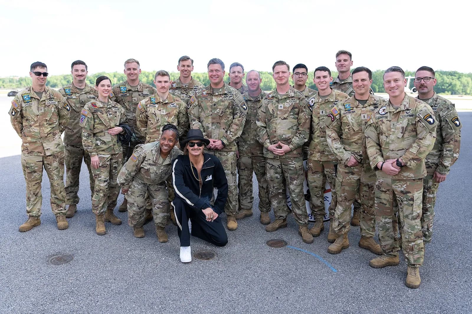 Kid Rock poses with U.S. military personnel at Davison Army Airfield.