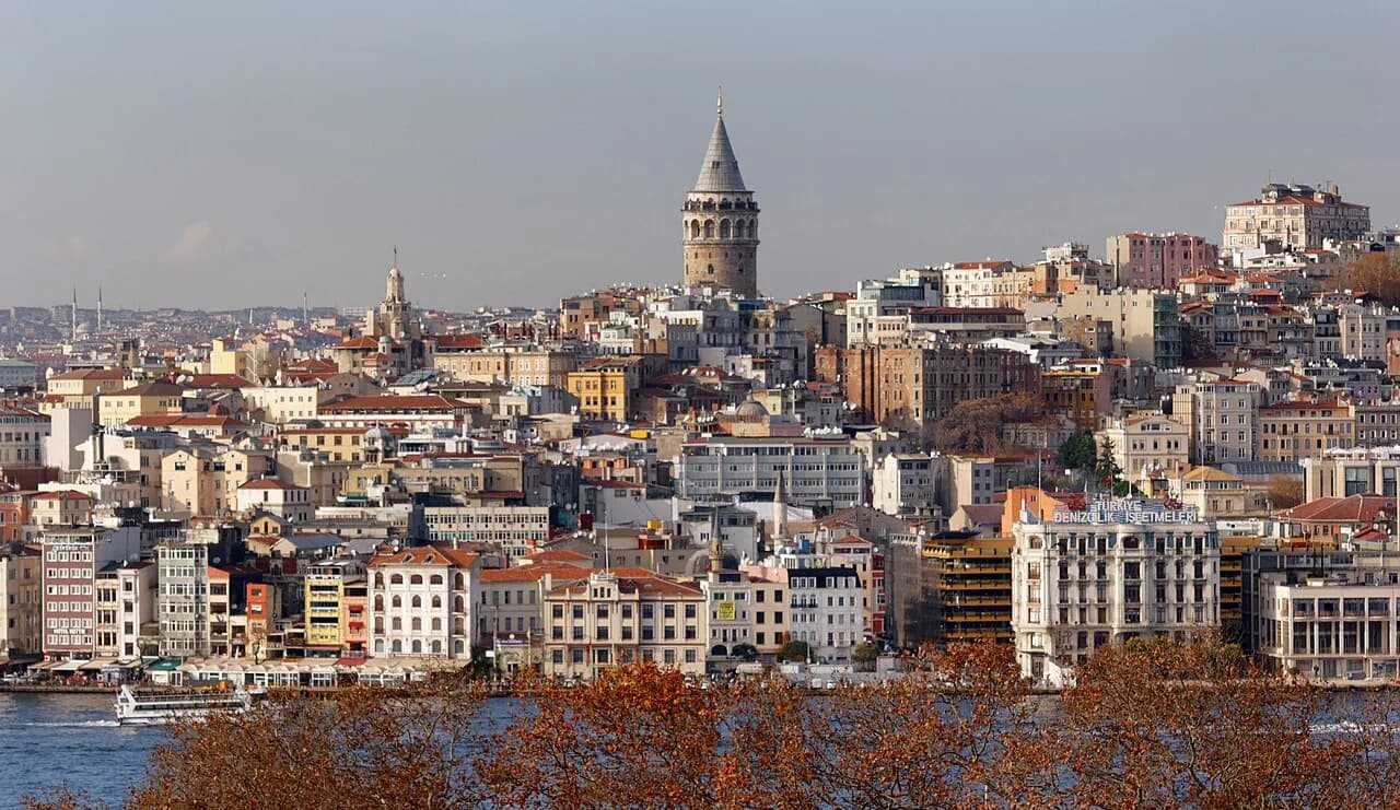 Galata Tower above Istanbul buildings and water