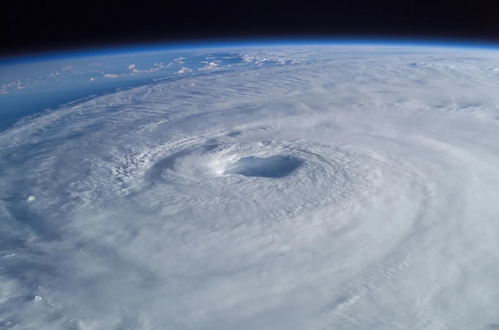 Hurricane Isabel viewed from the International Space Station, with its cloud bands visible over the ocean.