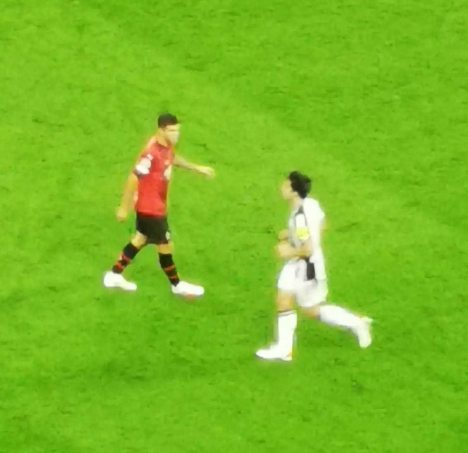 Christian Pulisic and Sandro Tonali during a match between AC Milan and Newcastle United.