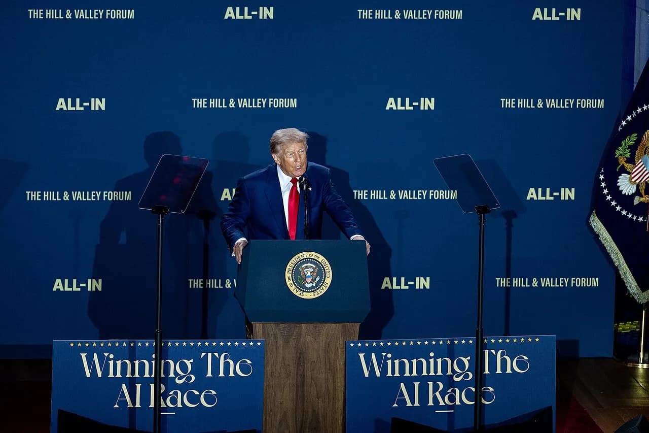 Donald Trump speaks at a lectern during a White House AI summit in Washington in July 2025.