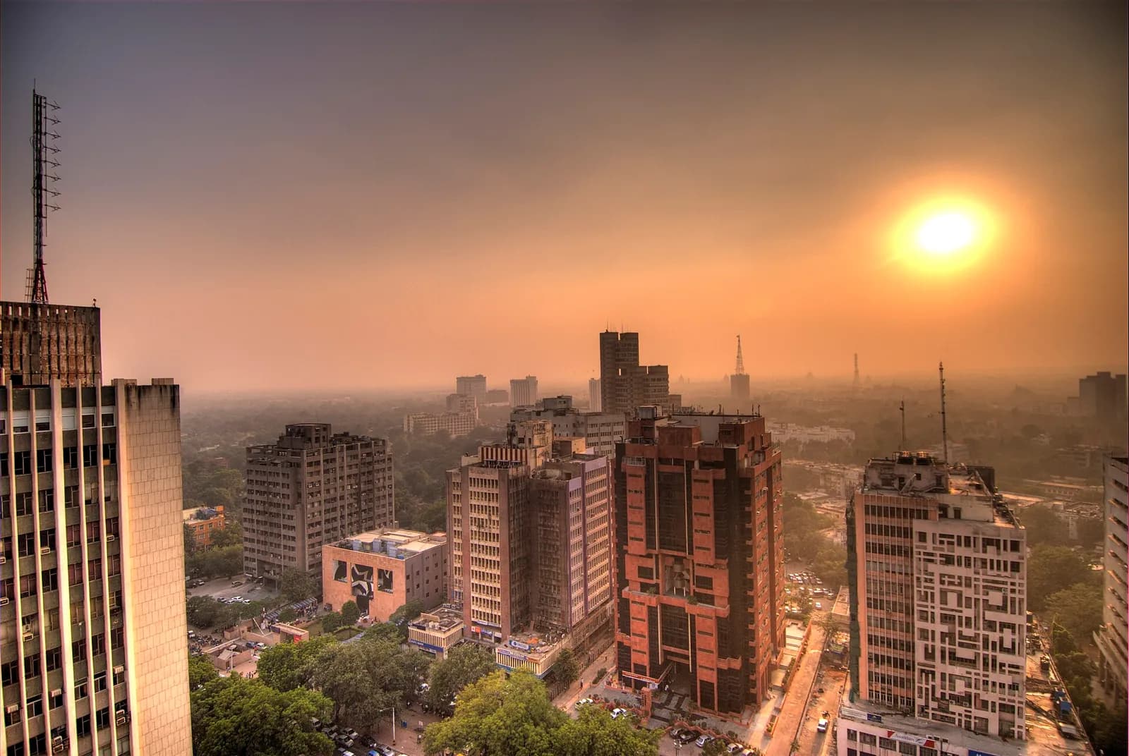 Sunset and smog over Connaught Place in Delhi.