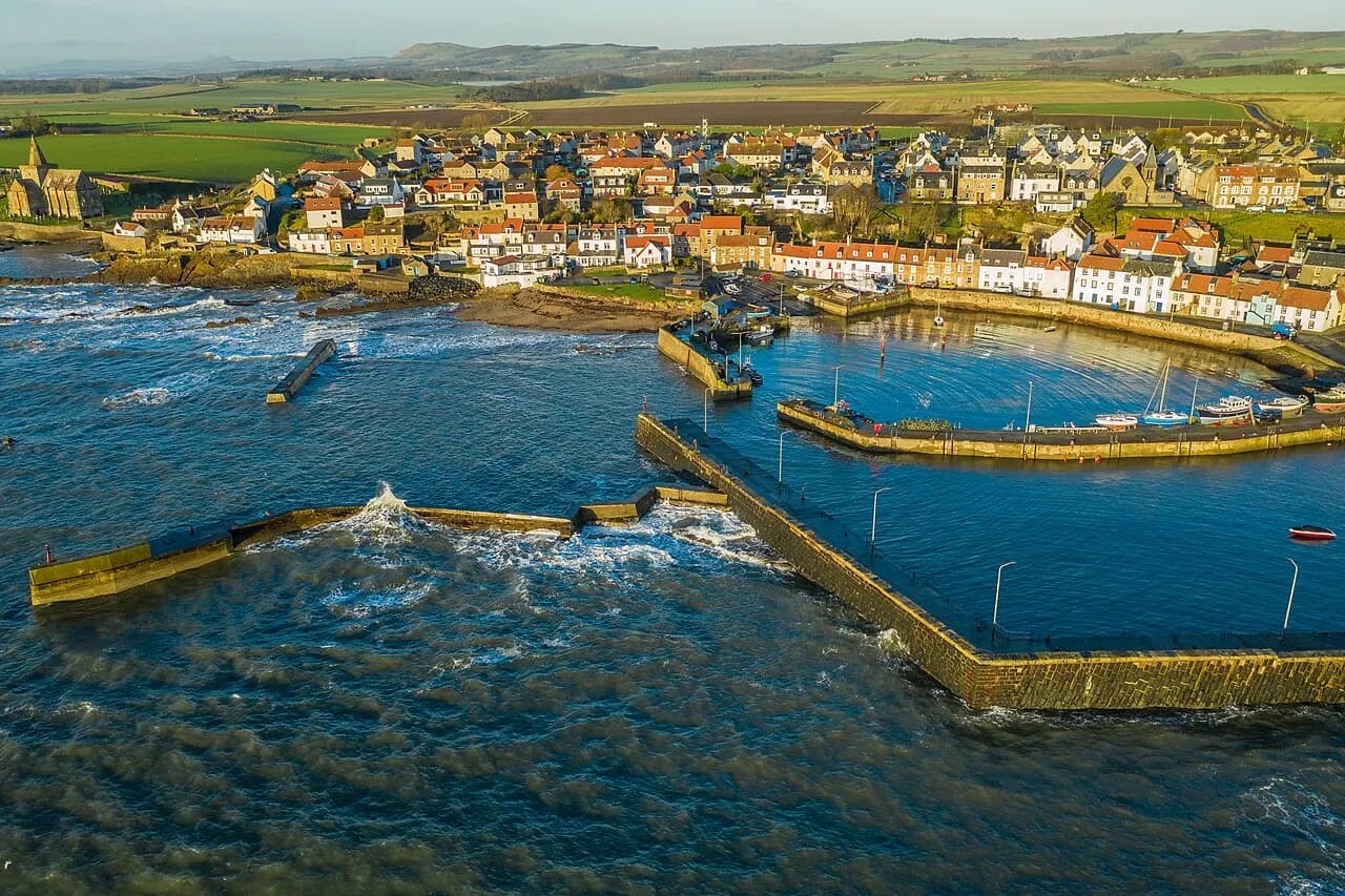 Aerial view of the breakwater and coast at St Monans in Fife, Scotland