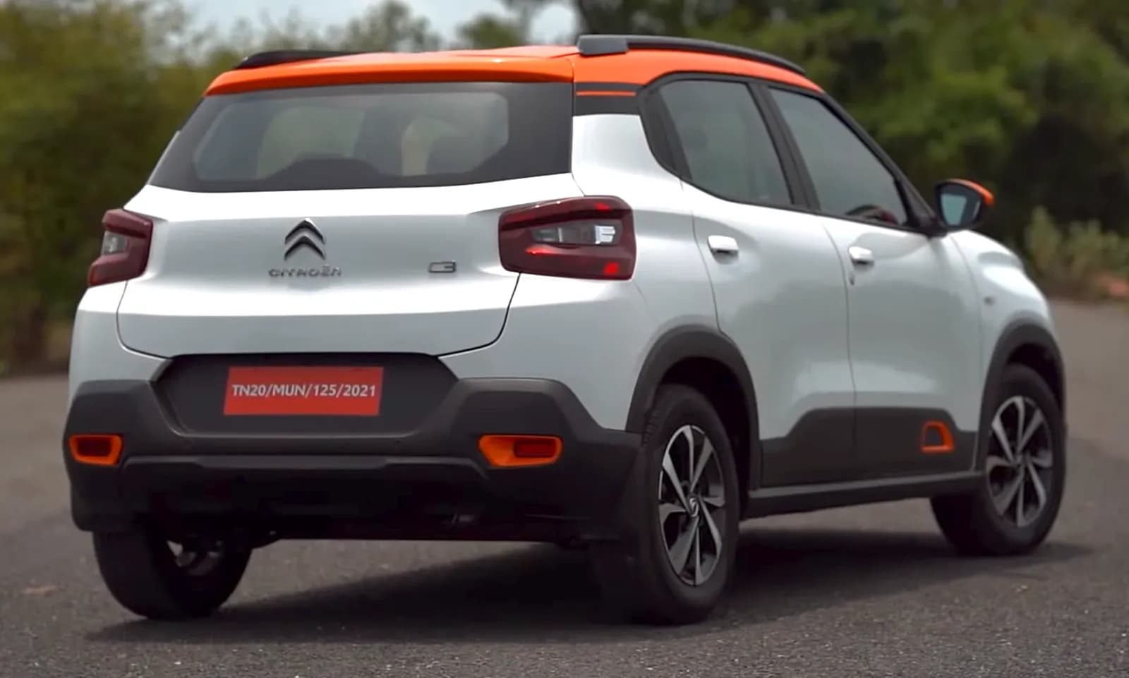 Rear view of a white 2022 Citroën C3 Feel Puretech 110, an India-market model.