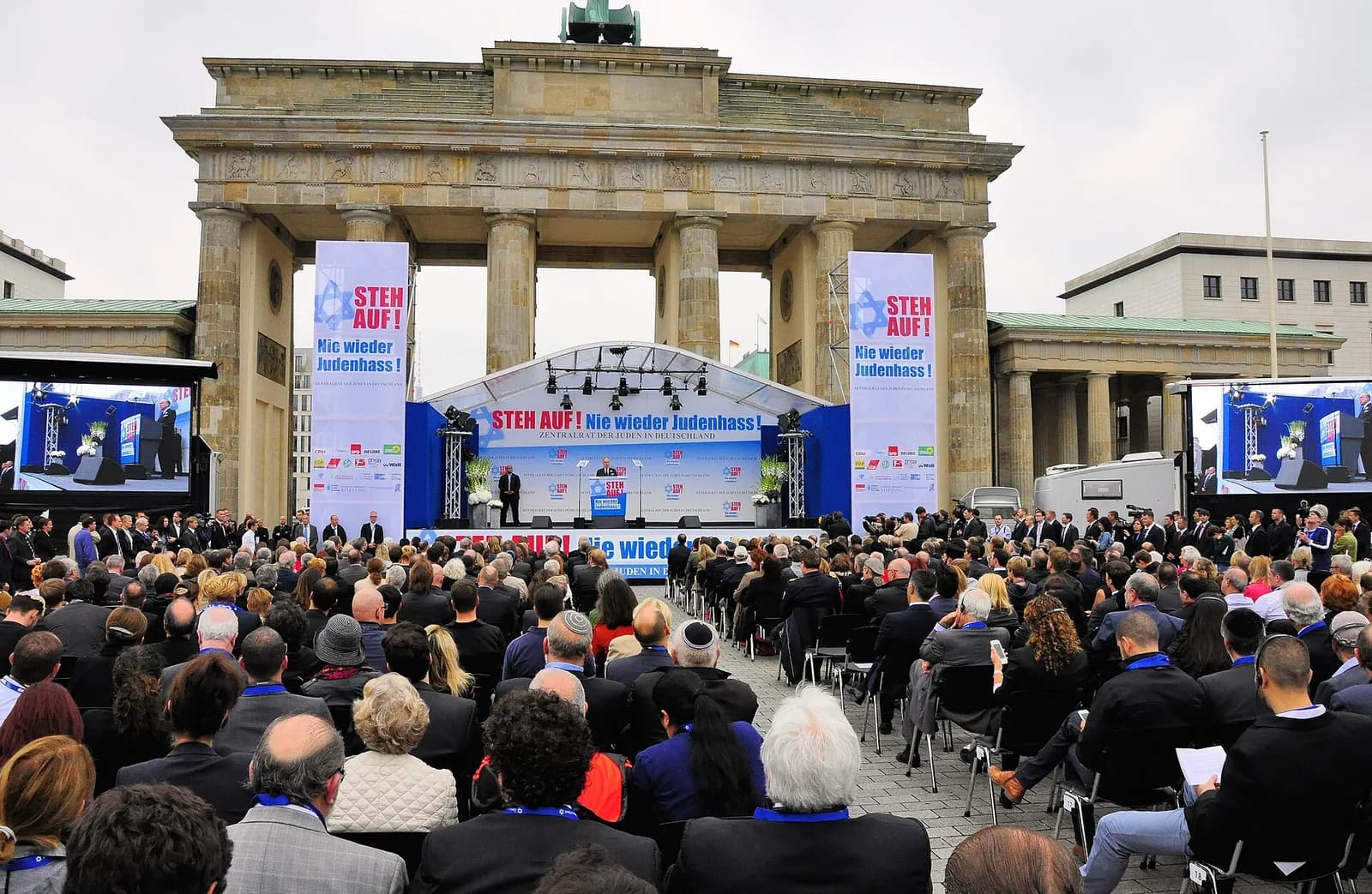 People attend a rally organized by the Central Council of Jews in Germany at Berlin’s Brandenburg Gate.