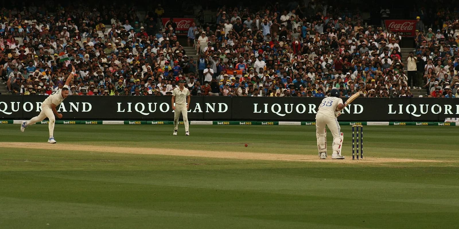 Scott Boland bowling to Nitish Kumar Reddy during a Test match.