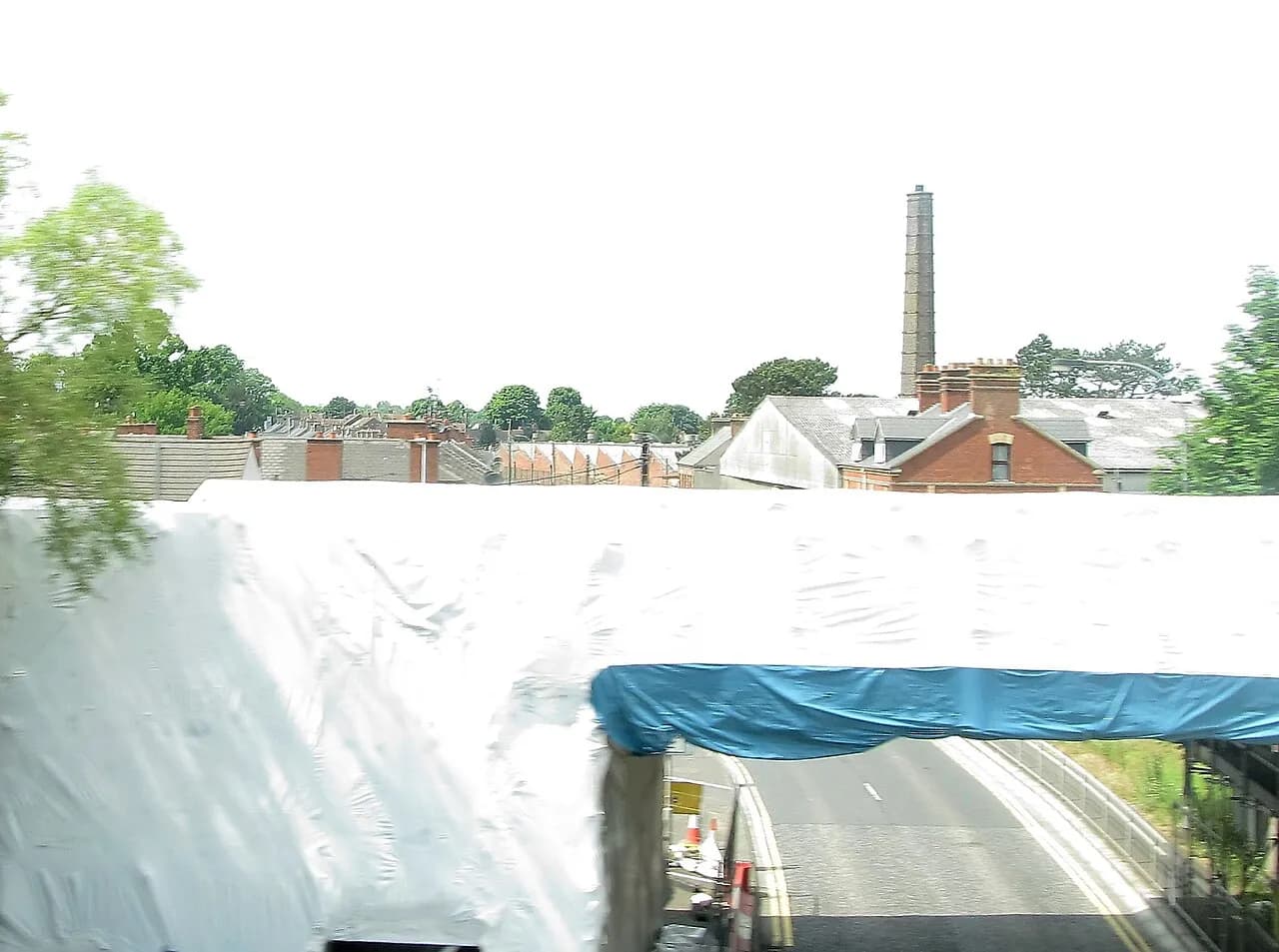 Railway bridge covered for works above Garvaghy Road in Portadown