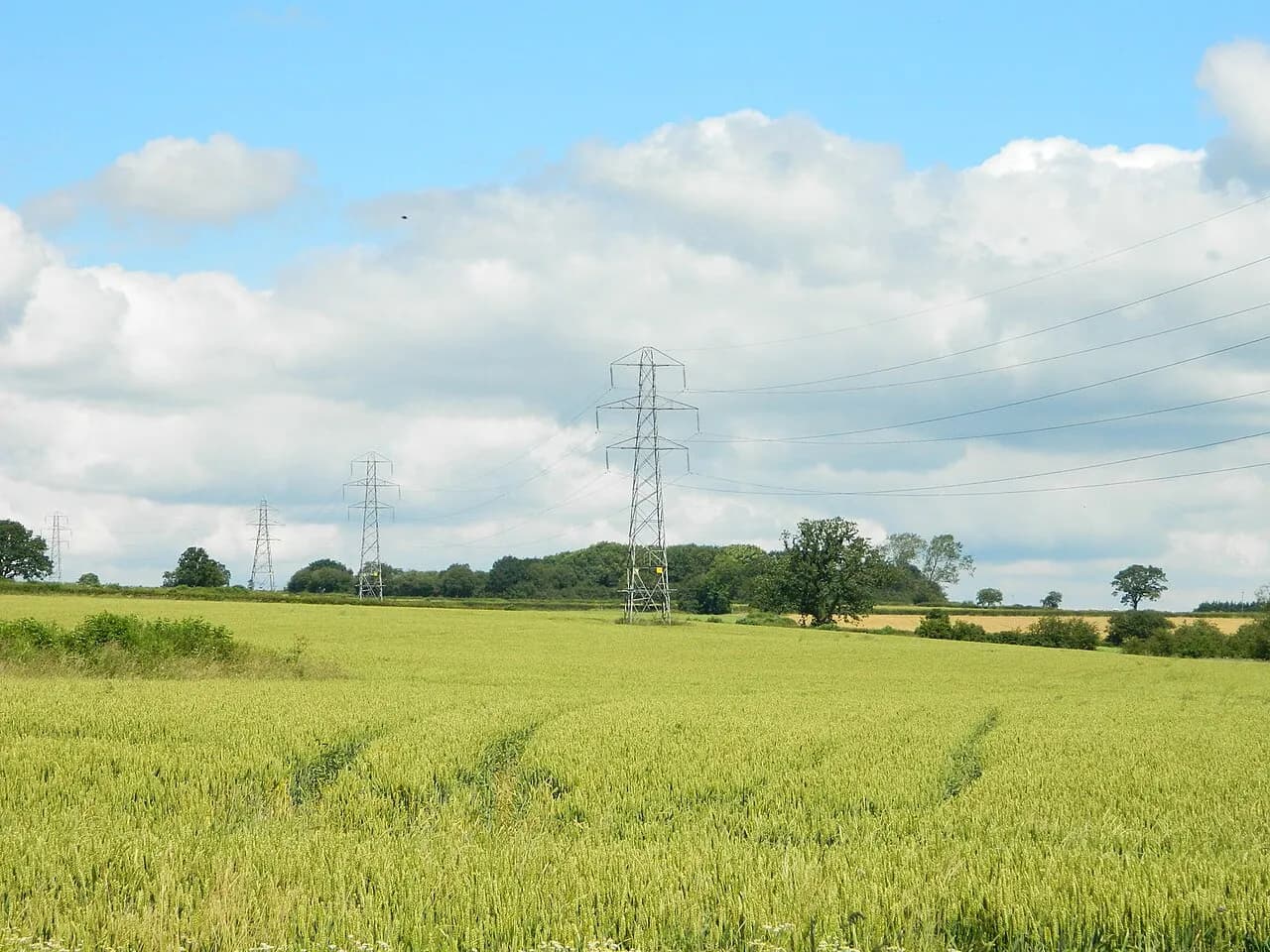 Electricity transmission pylons crossing farmland near Radbourne, Derbyshire.