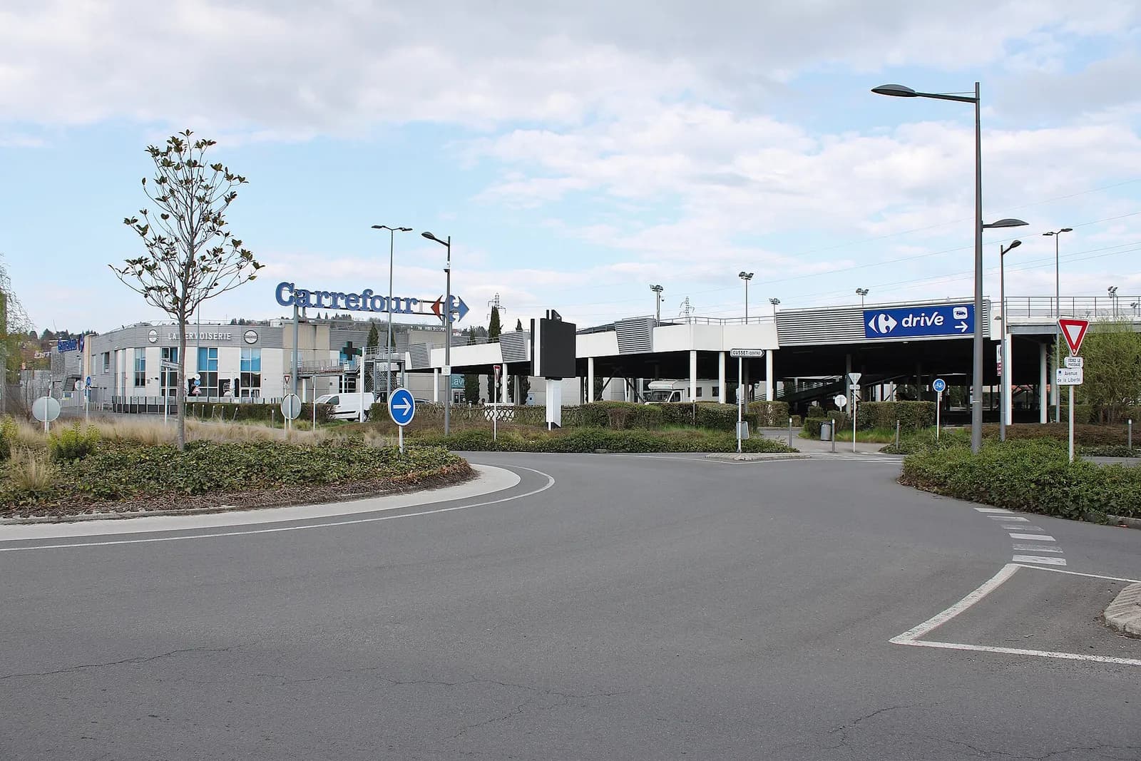 Exterior view of a Carrefour hypermarket in Cusset, France.