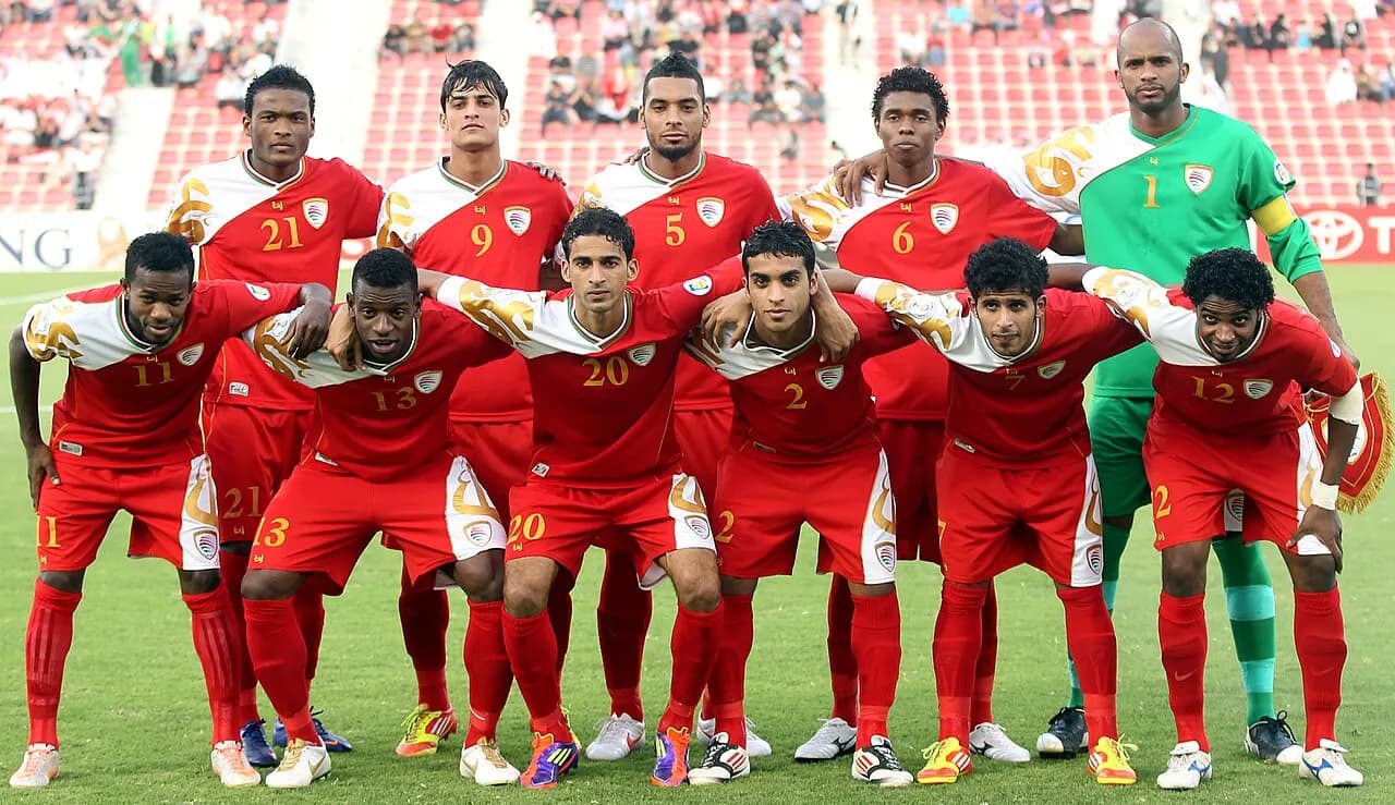 Oman national football team posing for a group photograph in Doha in 2012